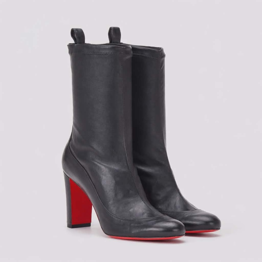 NIB. 37.5. Christian Louboutin “Gena” Bootie Black nappa stretch leather.